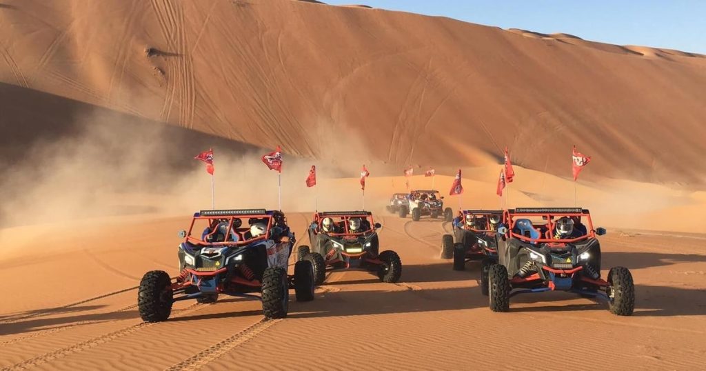 Dubai desert safari with sandboarding at Lahbab Red Dunes