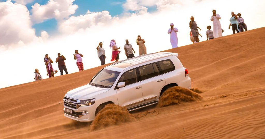 Buggy tour in Lahbab Desert Dubai across red sand dunes