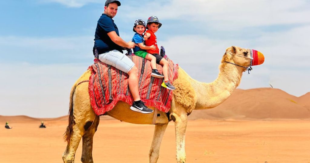 Camel ride across the red dunes of Lahbab Desert Dubai