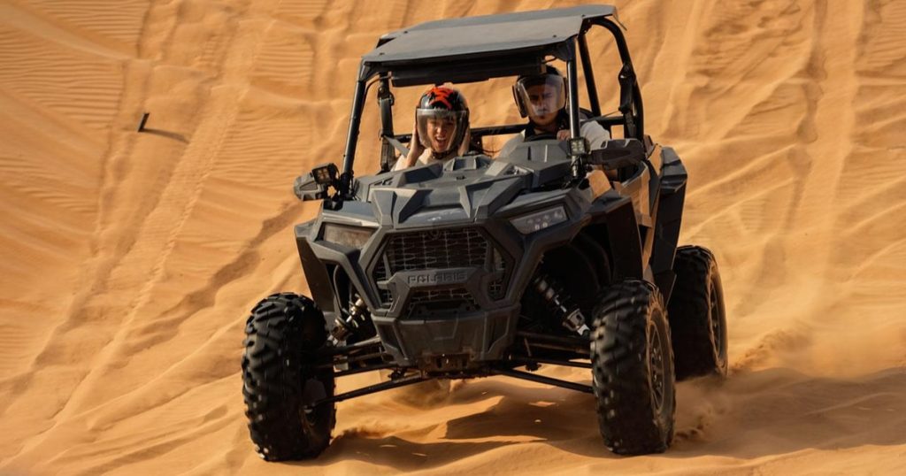 Dune Buggy Ride Dubai across red desert dunes